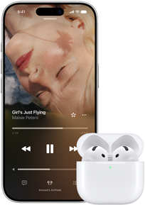 iPhone next to AirPods in charging case, case is open