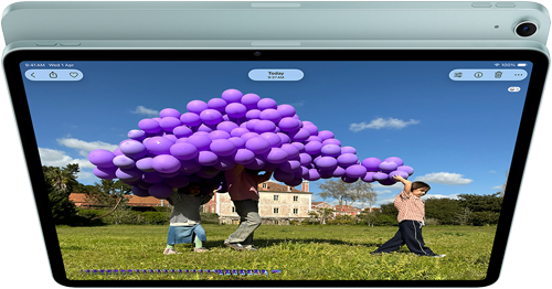 iPad Air, Blue color, top exterior, screen showing Keynote app on screen sharing feature during FaceTime video call, back exterior, 12MP Wide back camera, volume-up button, volume-down button