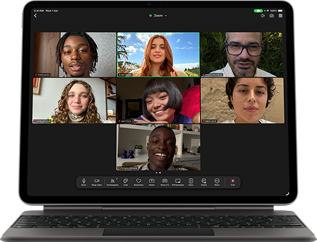 iPad Air, attached to Magic Keyboard, Black color, Group FaceTime call on screen