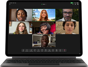 iPad Air, attached to Magic Keyboard, Black color, Group FaceTime call on screen
